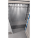 Empty secure 50sqft self storage unit interior